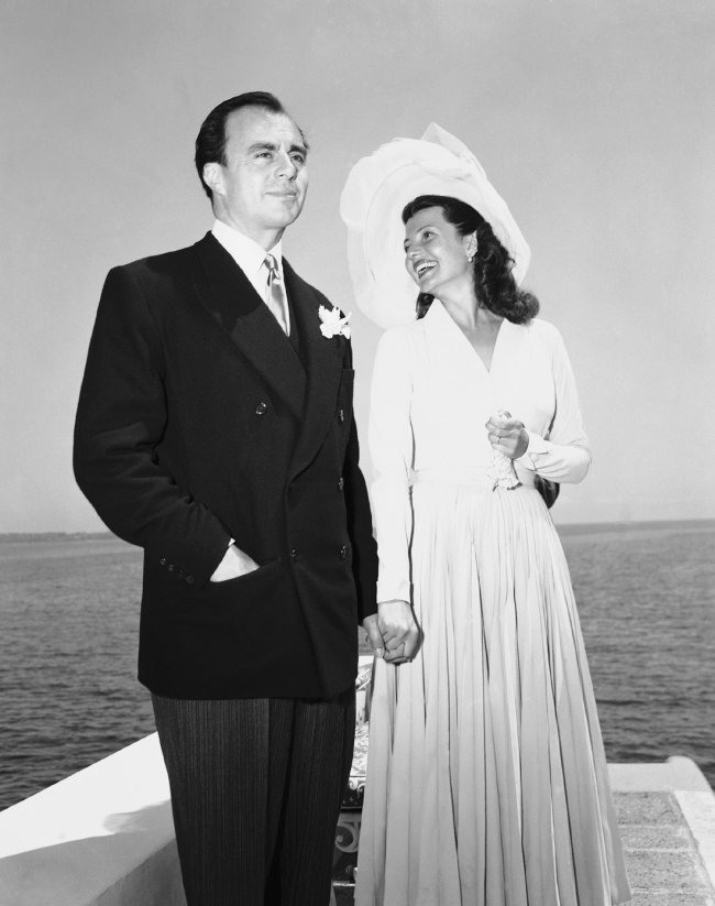 American actress Rita Hayworth became the bride of Prince Aly Khan on December 7, 1949. They are seen here during their wedding reception at the prince's Chateau de L'Horizon on the French Riviera. [File Photo: AP] 