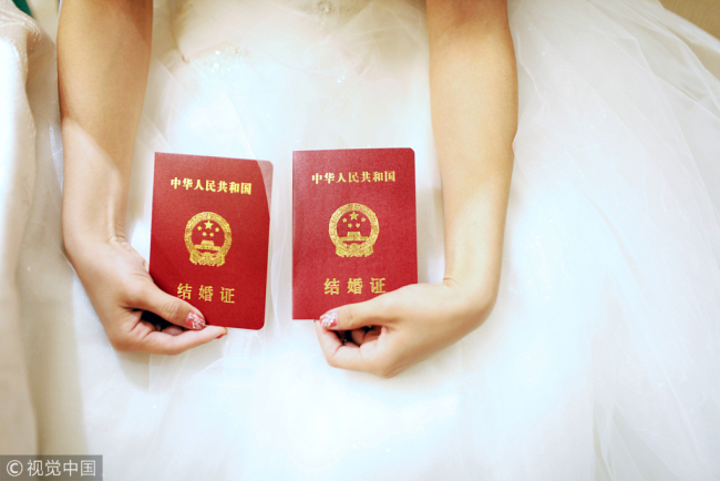 The central government has enabled information sharing of marriages registered both in China and abroad in its latest effort to improve the accuracy of verifying citizen's marital status and effectively prevent bigamy.[File Photo: VCG]