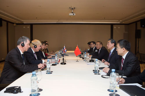 Chinese State Councilor and Foreign Minister Wang Yi holds talks with his British counterpart Boris Johnson on the sidelines of the G20 foreign ministers' conference in Buenos Aires on Monday. [Photo: fmprc.gov.cn]