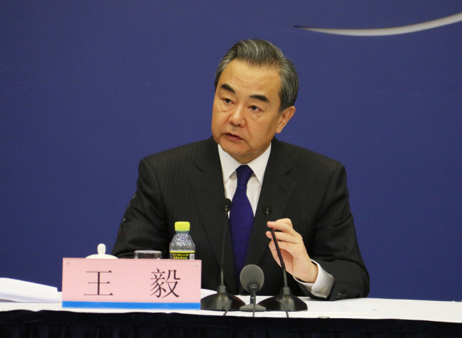 China's State Councilor and Foreign Minister Wang Yi briefs the media regarding the upcoming Shanghai Cooperation Organization (SCO) Qingdao Summit in Beijing on Monday, May 28, 2018. [Photo: China Plus]