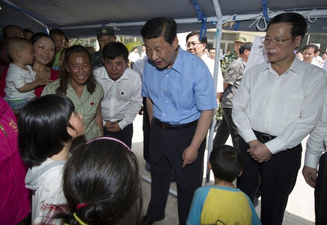 President Xi Jinping visits an earthquake-affected area in Lushan County, Sichuan Province on May 21, 2013. [Photo: China Plus]