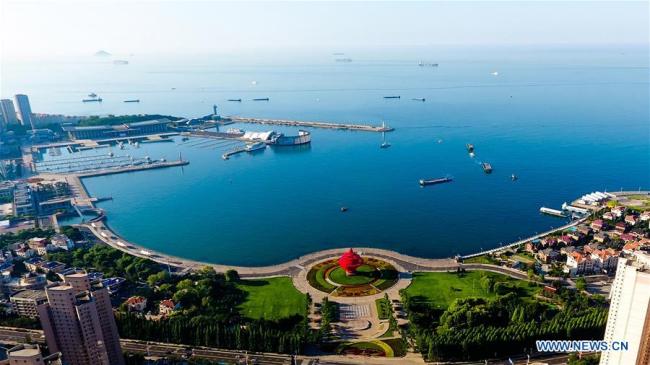 Aerial photo taken on June 1, 2018 shows scenery of Wusi Square and nearby places in Qingdao, east China's Shandong Province. Qingdao, a coastal city famous for its beaches and beer, is ready to impress the world during the forthcoming 18th Shanghai Cooperation Organization (SCO) summit. [Photo: Xinhua]  