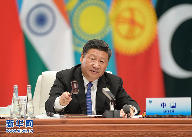 Chinese President Xi Jinping delivers a speech at the 18th Meeting of the Council of Heads of Member States of the Shanghai Cooperation Organization (SCO) in Qingdao, Shandong Province, on Sunday, June 10, 2018. [Photo: Xinhua]