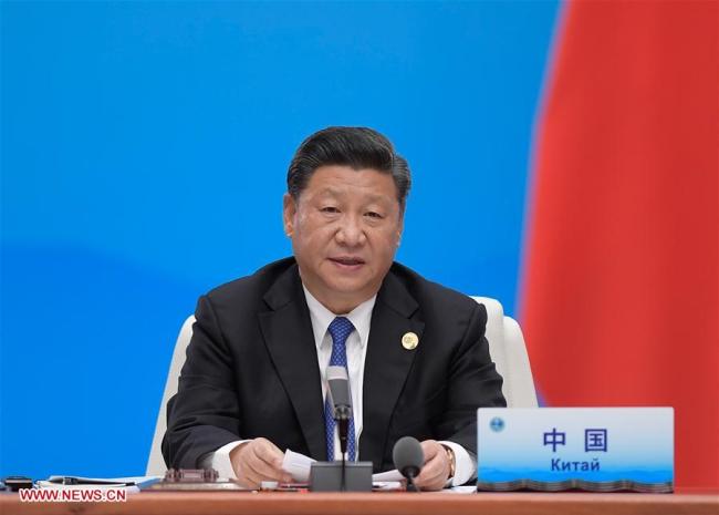 Chinese President Xi Jinping chairs the 18th Meeting of the Council of Heads of Member States of the Shanghai Cooperation Organization (SCO) in Qingdao, east China's Shandong Province, June 10, 2018.[Photo: Xinhua]