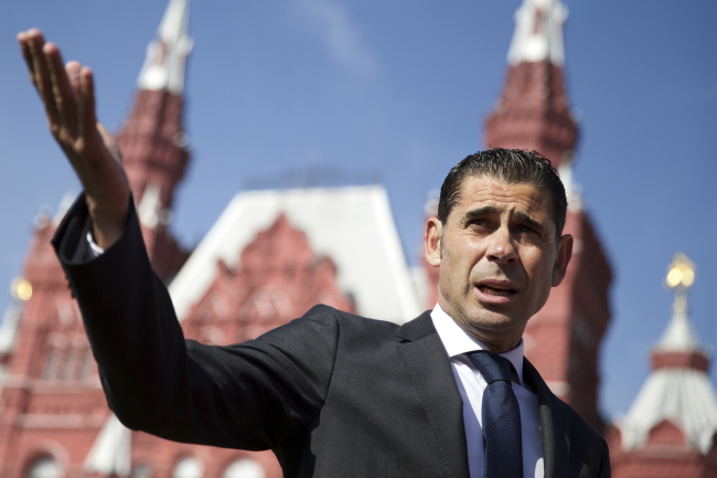 Former Spanish soccer star Fernando Hierro gestures as he speaks with the media at Red Square in Moscow, Russia, on Friday, Sept. 18, 2015. Russian and FIFA officials unveil clock counting down 1,000 days to go until Russia's World Cup 2018 starts. [Photo: AP/Pavel Golovkin]