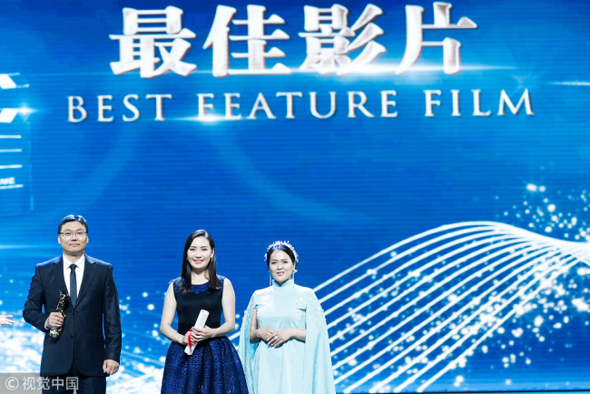 The movie "Out of Paradise", directed by Batbayar Chogsom, won the best feature film award at the Shanghai International Film Festival in Shanghai on June 24, 2018. [Photo: VCG]