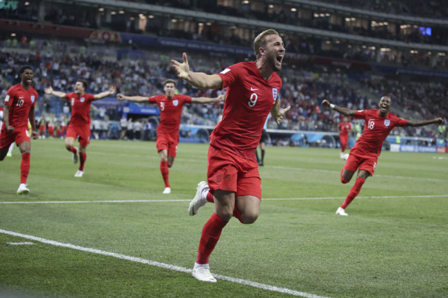 Harry Kane celebrates after scoring during a Group G match between Tunisia and England at the 2018 soccer World Cup in the Volgograd Arena in Volgograd, Russia, Monday, June 18, 2018. [Photo: AP]