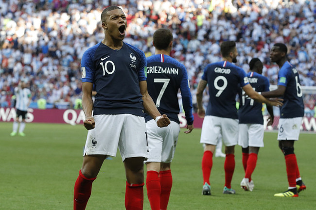 France's Kylian Mbappe celebrates after scoring his side's third goal during the round of 16 match between France and Argentina, at the 2018 soccer World Cup at the Kazan Arena in Kazan, Russia, Saturday, June 30, 2018. [Photo: AP]