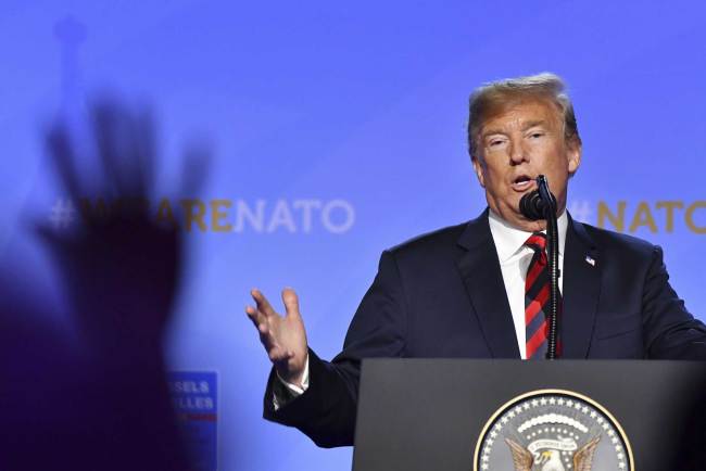 U.S. President Donald Trump speaks during a press conference after a summit of heads of state and government at NATO headquarters in Brussels, Belgium, Thursday, July 12, 2018. NATO leaders gather in Brussels for a two-day summit. [Photo: AP/Geert Vanden Wijngaert]