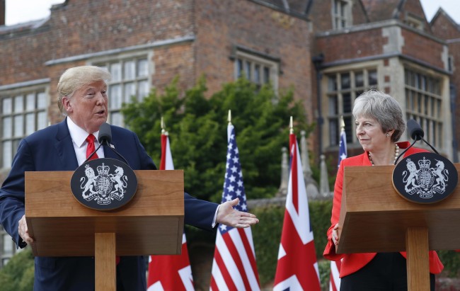 President Donald Trump with British Prime Minister Theresa May during their joint news conference at Chequers, in Buckinghamshire, England, Friday, July 13, 2018. (Photo: AP/Pablo Martinez Monsivais)