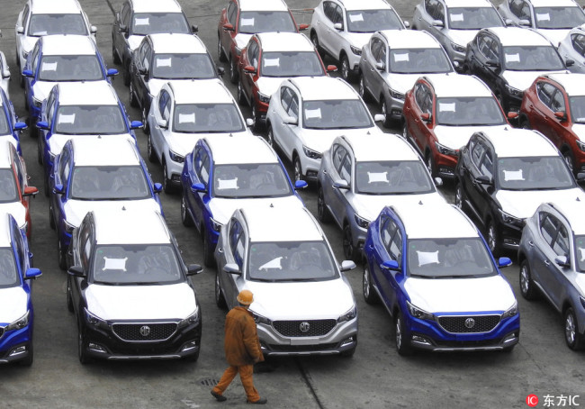 Sedans of SAIC´s MG Motor to be shipped to San Antonio of the United States are lined up on the quay of the Port of Lianyungang city, east China´s Jiangsu province, 26 May 2018. [Photo: IC]
