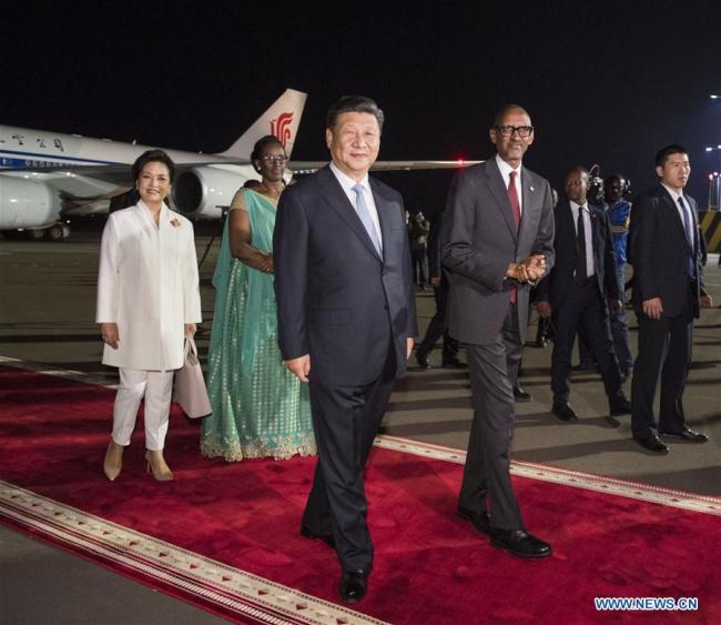 Chinese President Xi Jinping (L, front) arrives in Kigali on July 22, 2018 for a state visit to Rwanda. Upon their arrival, Xi and his wife Peng Liyuan were warmly received by Rwandan President Paul Kagame and his wife Jeannette Kagame. [Photo: Xinhua/Li Xueren]