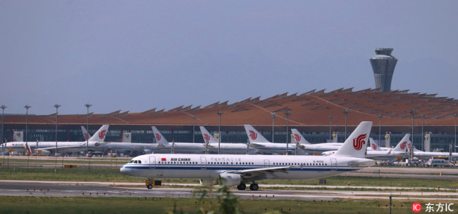 Air China jets parked at Beijing Capital International Airport on June 20, 2018. [Photo: IC]