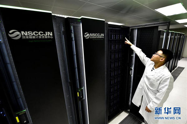 A developer checks the running of the Sunway exascale computer prototype at the National Supercomputing Center in Jinan, east China's Shandong Province, on August 5th, 2018. [Photo: Xinhua/Guo Xulei]