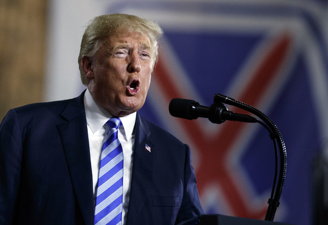 President Donald Trump speaks at Fort Drum, N.Y., Monday, Aug. 13, 2018, before a signing ceremony for a $716 billion defense policy bill named for Sen. John McCain. [Photo: AP/Carolyn Kaster]