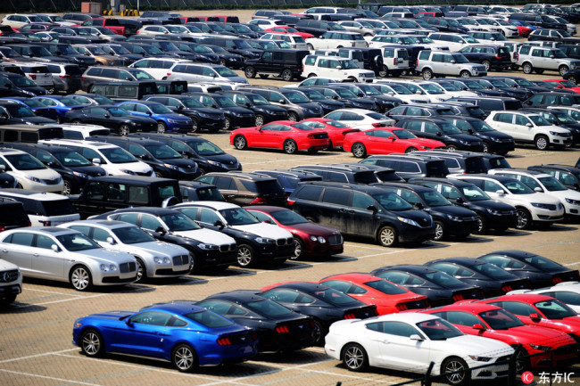 Imported cars are lined up on a quay at the Port of Qingdao in Qingdao, Shandong province. [File Photo: IC]