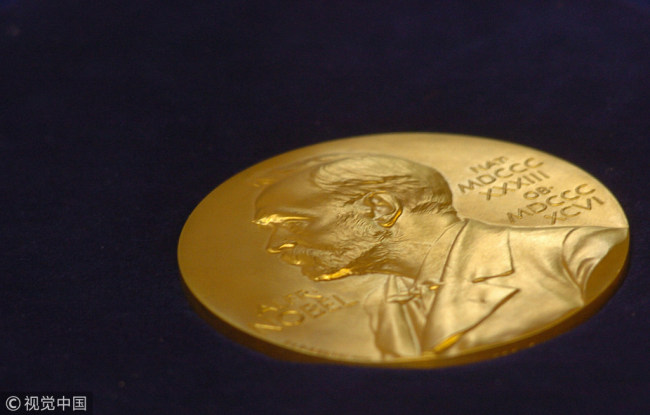 In this file photo taken on May 07, 2005 the gold replica of the Nobel medal is on display during the function of the Replacement of the Nobel Medallion at Shantiniketan, about 200 kms north of Calcutta. [File Photo: VCG]