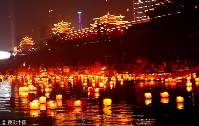 Water lanterns floating on a river during celebrations for Zhongyuan Festival, also known as the Ghost Festival, in Guilin, Guangxi Zhuang Autonomous Region on August 16, 2016. [File Photo: VCG]