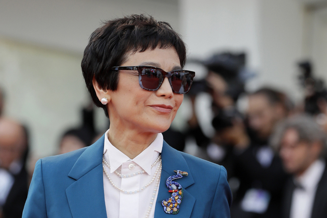 Jury member Sylvia Chang poses for photographers at the premiere of the film 'First Man' and the opening Ceremony of the 75th edition of the Venice Film Festival in Venice, Wednesday, Aug. 29, 2018. [Photo: AP/Kirsty Wigglesworth]