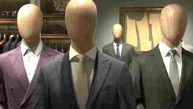 Suits designed by Chinese firm Hodo Group displayed at domestic stores. [Photo: CGTN]