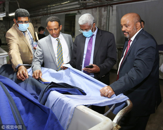 Members of an Ethiopian delegation visit a textile company in Nantong, Jiangsu Province. [File photo: VCG]