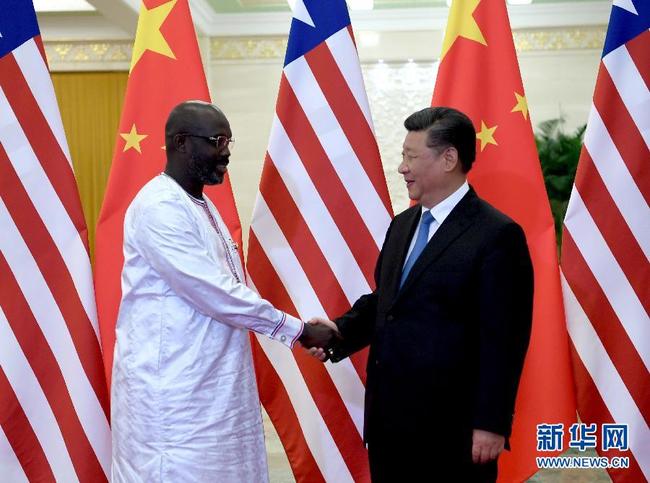 Chinese President Xi Jinping (right) meets Liberian President George Weah in Beijing on Sep. 1 2018. [Photo: Xinhua]