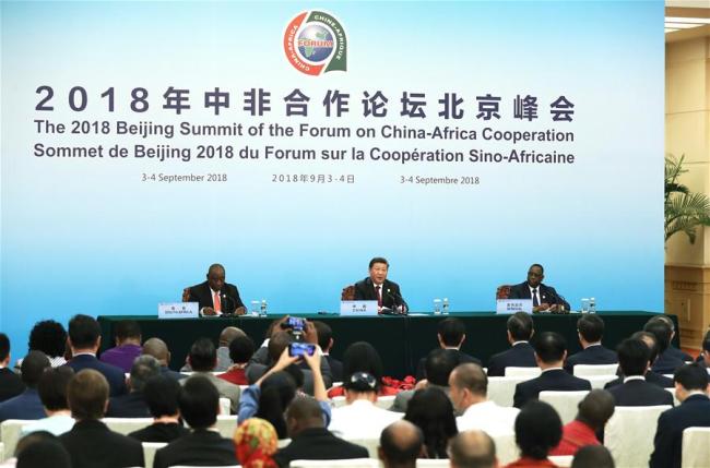 Chinese President Xi Jinping (C, back) meets the press together with South African President Cyril Ramaphosa (L, back) and Senegalese President Macky Sall, former and new African co-chair of the Forum on China-Africa Cooperation (FOCAC), after the conclusion of the 2018 FOCAC Beijing Summit at the Great Hall of the People in Beijing, capital of China, Sept. 4, 2018. [Photo: Xinhua/Liu Weibing]