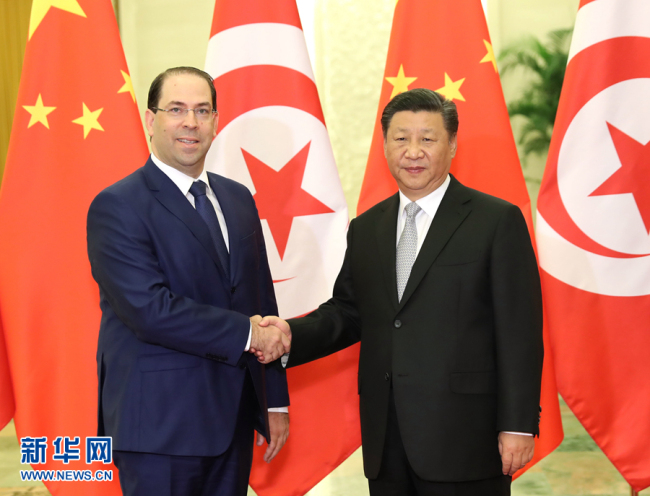 Chinese President Xi Jinping meets with Tunisian Prime Minister Youssef Chahed in Beijing on Wednesday, September 05, 2018. [Photo: Xinhua]