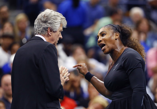 Serena Williams, right, talks with referee Brian Earley during the women's final of the U.S. Open tennis tournament against Naomi Osaka, of Japan, Saturday, Sept. 8, 2018, in New York. [Photo: AP/Adam Hunger]