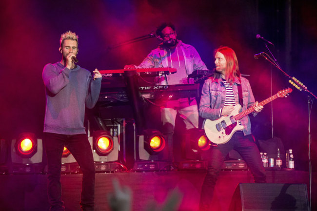 Adam Levine, from left, PJ Morton and James Valentine of Maroon 5 perform at BottleRock Napa Valley Music Festival at Napa Valley Expo on Friday, May 26, 2017, in Napa, Calif. [Photo: Amy Harris/Invision/AP]