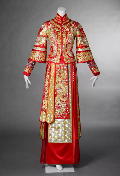 The Auspicious Dragon and Phoenix Wedding Dress made by Guo Pei features a lavish embroidery technique. It is now being shown as part of the ongoing "Legend of Design" exhibition, which opened in Beijing on September 25, 2018. [Photo: provided to China Plus]