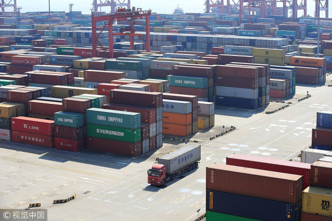 Containers are seen at the Yangshan Deep Water Port, part of the Shanghai Free Trade Zone, in Shanghai, China February 13, 2017. [File Photo: VCG]