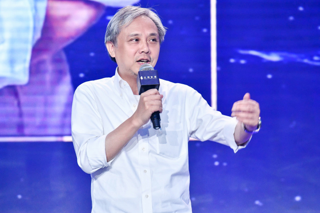 Hong Kong film director and producer Gordon Chan speaks at an event in Beijing, September 26, 2018. Tencent has announced the launch of a new project to nurture young movie directors in China. [Photo: provided to China Plus]
