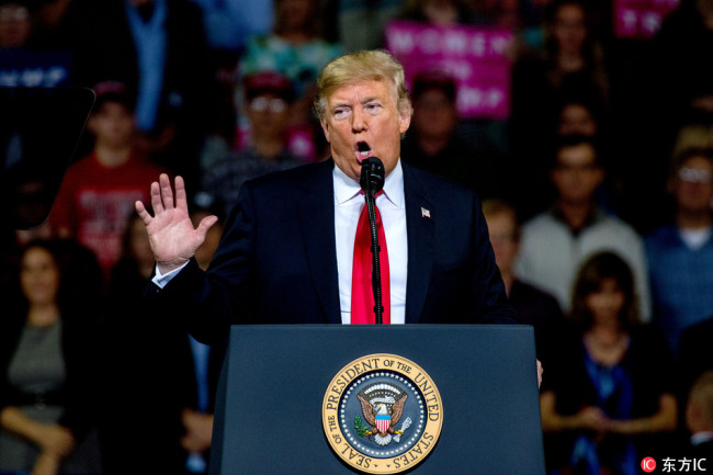 U.S. President Donald Trump speaks at rally in support of Kansas Secretary of State Kris Kobach who is the Republican candidate for governor in Topeka of Kansas, USA, on October 6, 2018. [Photo: IC]