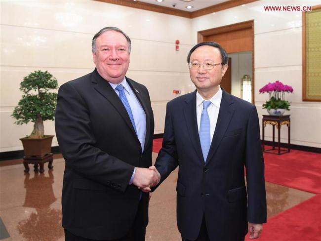 Yang Jiechi (R), a member of the Political Bureau of the Central Committee of the Communist Party of China (CPC) and director of the Office of the Foreign Affairs Commission of the CPC Central Committee, meets with U.S. Secretary of State Mike Pompeo in Beijing, capital of China, Oct. 8, 2018. [Photo: Xinhua]
