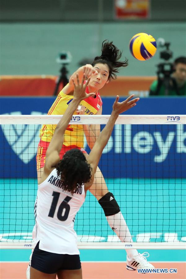 Zhu Ting (top) of China spikes during the Pool F match against the United States at the 2018 Volleyball Women's World Championship in Osaka, Japan, Oct. 10, 2018. China won 3-0. [Photo: Xinhua/Du Xiaoyi]