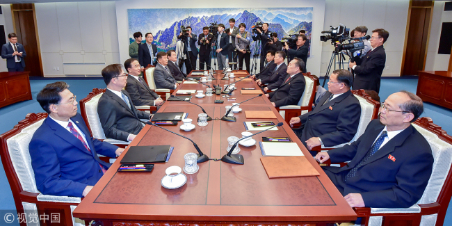 Representatives from South Korea and the Democratic People's Republic of Korea hold talks in the Freedom House on October 15, 2018. [Photo: VCG]
