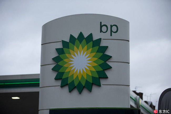 The logo of the BP is seen outside its petrol station in East Molesey, southwest London, Tuesday, Feb. 2, 2016. [Photo: IC]