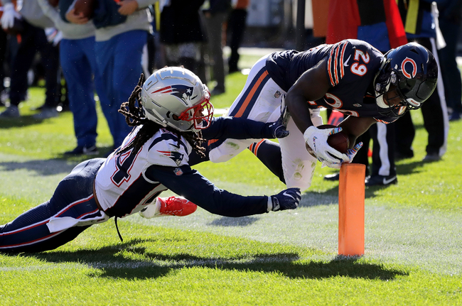 Brady throws three TDs, Bears come up one yard short on Hail Mary