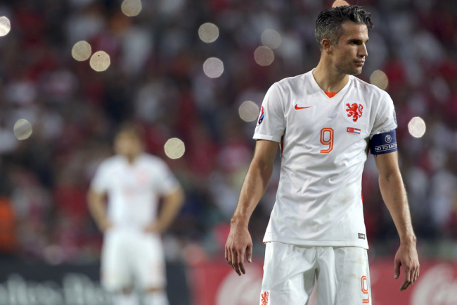 Robin Van Persie of the Netherlands reacts after they lost 3-0 to Turkey during their Euro 2016 Group A qualifying soccer match at the Buyuksehir Torku Arena Stadium in Konya, Turkey, Sunday, Sept. 6, 2015. [Photo: AP]