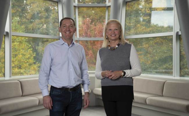 Ginni Rometty, Chairman, President, and CEO of IBM, at right, and James M. Whitehurst, CEO of Red Hat, left, announced, Sunday, October 28, 2018, Armonk NY, that the companies have reached a definitive agreement under which IBM will acquire all of the issued and outstanding common shares of Red Hat for $190.00 per share in cash, representing a total enterprise value of approximately $34 billion. This acquisition brings together the best-in-class hybrid cloud providers and will enable companies to securely move all business applications to the cloud. [Photo: AP]