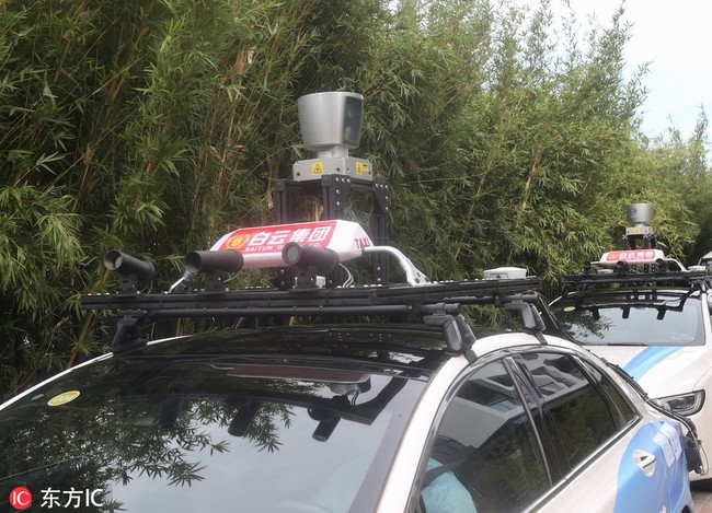 A self-driving taxi on the road in Guangzhou, Guangdong Province, seen here on Thursday, November 1, 2018. [Photo: VCG] 