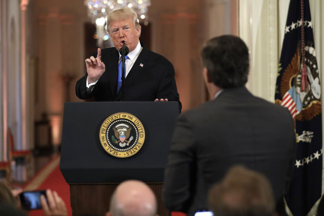 President Donald Trump speaks with CNN White House correspondent Jim Acosta during a news conference in the East Room of the White House, Wednesday, Nov. 7, 2018, in Washington. [Photo: AP/Evan Vucci]