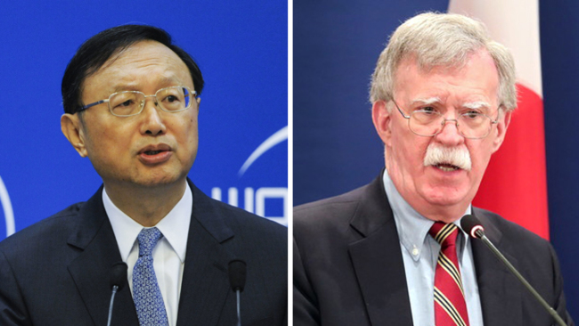 Yang Jiechi, director of the Office of the Foreign Affairs Commission of the CPC Central Committee, and U.S. national security advisor John Bolton [Photo: China Plus]