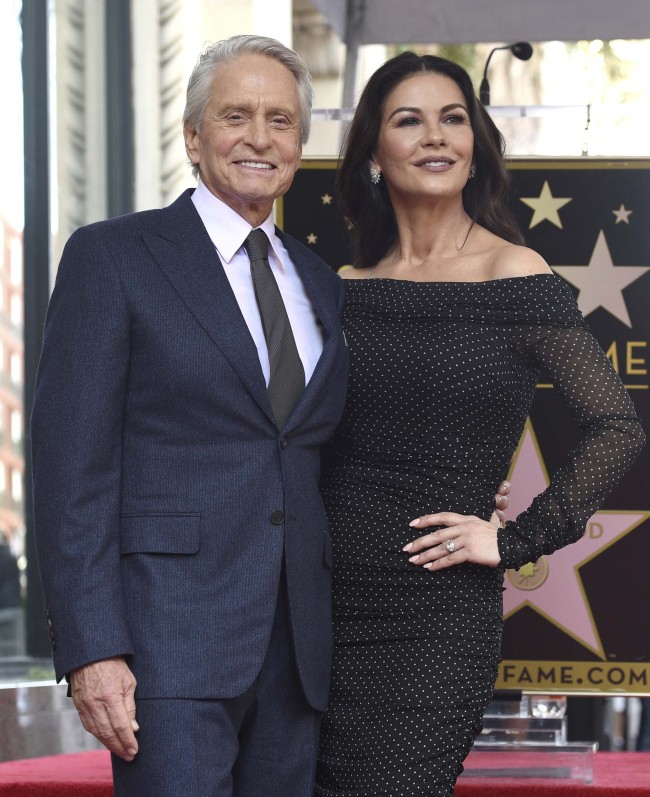 Actor Michael Douglas, left, and his wife Catherine Zeta-Jones attend a ceremony honoring Douglas with a star on the Hollywood Walk of Fame on Tuesday, Nov. 6, 2018, in Los Angeles. [Photo: AP]