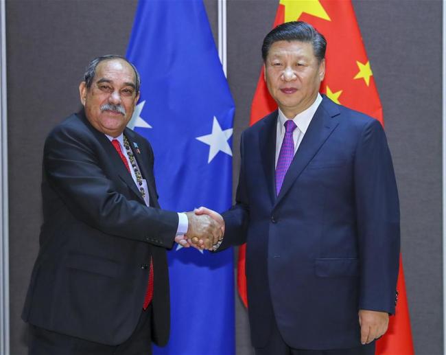 Chinese President Xi Jinping (R) meets with President of the Federated States of Micronesia Peter Christian in Port Moresby, Papua New Guinea, on Nov. 16, 2018. Xi met here on Friday with leaders of Pacific island countries that have diplomatic relations with China. [Photo: Xinhua/Xie Huanchi]
