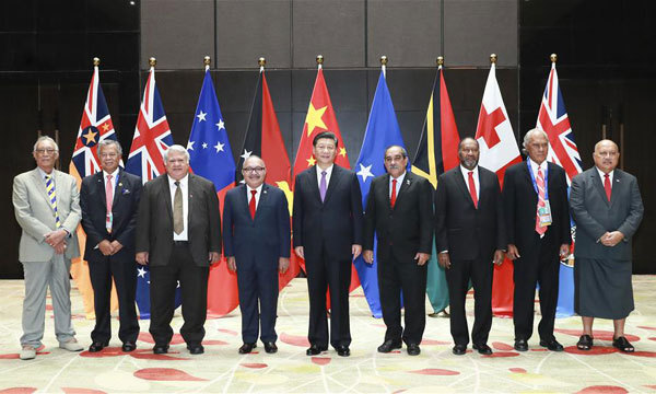 Chinese President Xi Jinping hosts a collective meeting with Papua New Guinea Prime Minister Peter O'Neill, President Peter Christian of the Federated States of Micronesia, Prime Minister Tuilaepa Malielegaoi of Samoa, Vanuatu Prime Minister Charlot Salwai, Prime Minister Henry Puna of the Cook Islands, Prime Minister Samuela Akilisi Pohiva of Tonga, Niue Premier Toke Talagi and Fiji government representative, Defense Minister Ratu Inoke Kubuabola, and delivers a keynote speech in Port Moresby, Papua New Guinea, November 16, 2018. [Photo: Xinhua/Pang Xinglei]