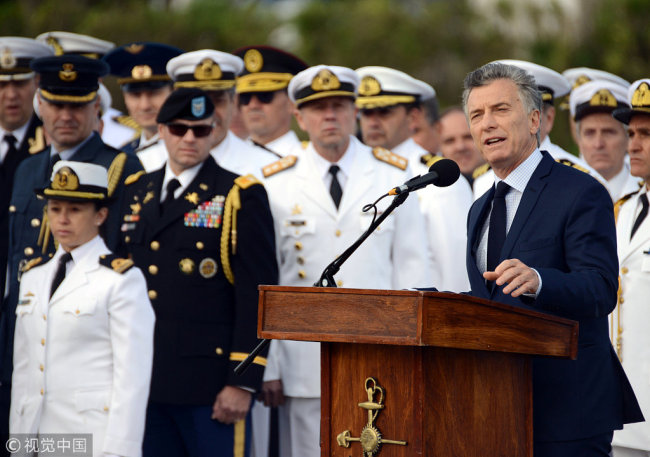 Argentine President Mauricio Macri speaks alongside members of the Navy and relatives of the 44 crew members of the missing at sea ARA San Juan submarine, during a ceremony to commemorate the one year anniversary of the tragedy in Mar del Plata, Argentina November 15, 2018. [Photo: VCG/Marina Devo]