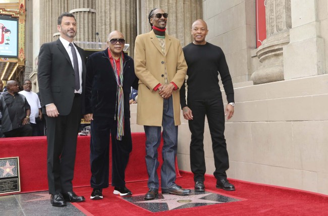 Rapper Snoop Dogg, second right, poses atop his new star on the Hollywood Walk of Fame with comedian Jimmy Kimmel, from left, producer Quincy Jones and rapper/producer Dr. Dre on Monday, Nov. 19, 2018, in Los Angeles. [Photo: AP]