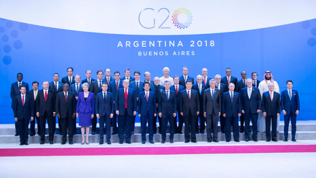 Chinese President Xi Jinping (6th R, front) poses for a group photo with other leaders attending the 13th summit of the Group of 20 in Buenos Aires, Argentina, Nov. 30, 2018. [Photo: Xinhua]